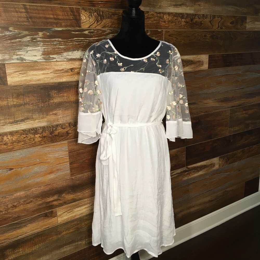 Beautiful white dress with upper sheer mesh